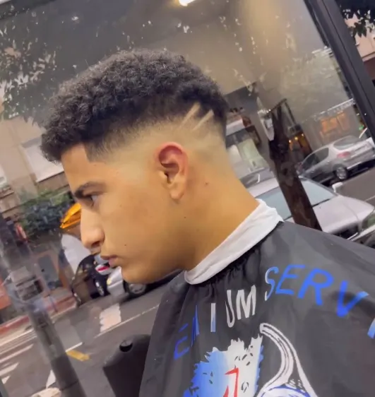 Muestra de cortes de pelo realizados en la barbería